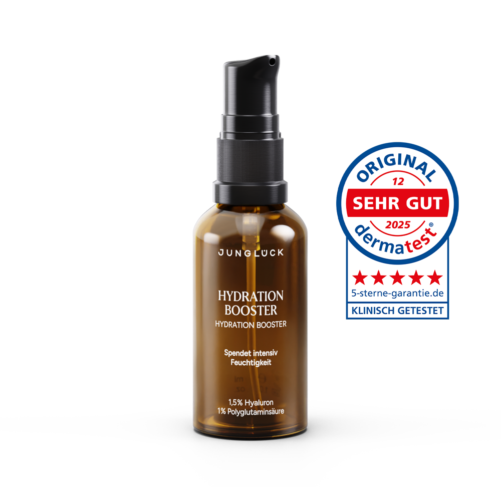 Braunglasflasche mit schwarzem Pumpkopf, Aufschrift 'HYDRATION BOOSTER', Dermatest-Siegel 'SEHR GUT'.