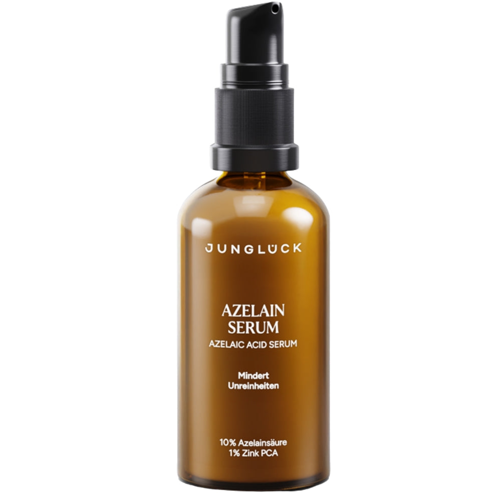 Braunglasflasche mit Pumpspender, enthält Azelainsäure, mildes Serum zur Minderung von Unreinheiten.
