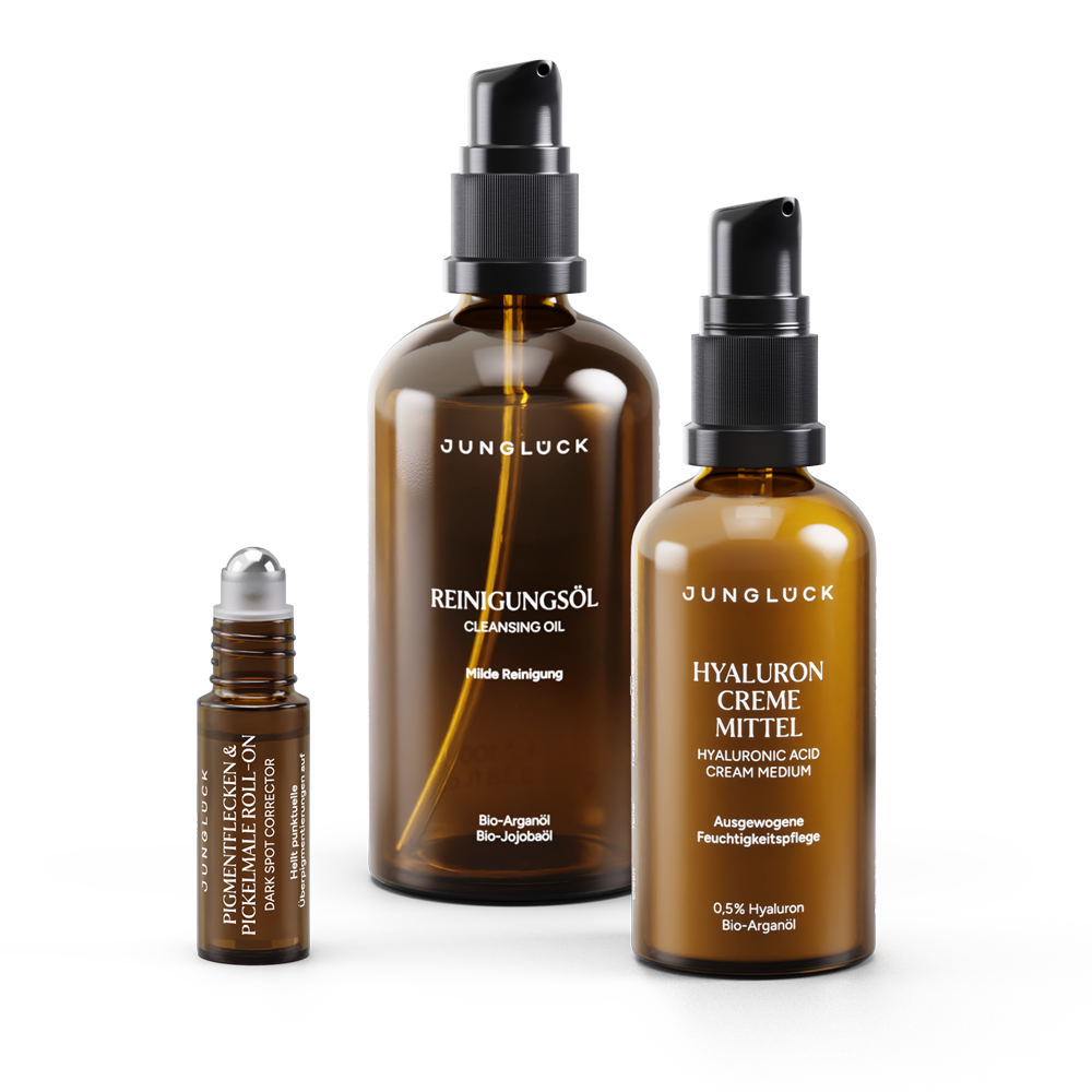 Set zur Aufhellung von Pigmentflecken: Reinigungsol, Hyaluron Creme und Roll-On für gezielte Pflege.