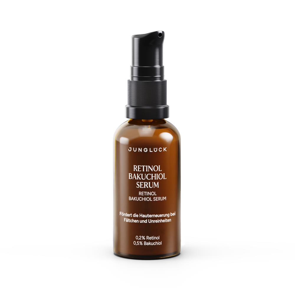 Braunglasflasche mit dunkelgrünem Pumpspender, Retinol Bakuchiol Serum 30ml von JUNGLÜCK, fördert die Hauterneuerung.