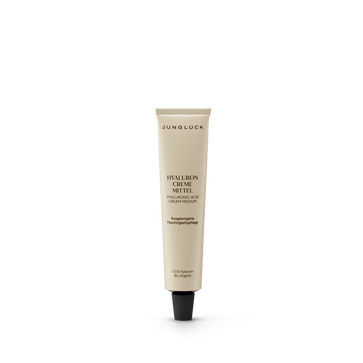 Hyaluron Creme Mittel in einer 10 ml Tube. Verpackung beige mit schwarzem Schriftzug, beschreibt feuchtigkeitsspendende