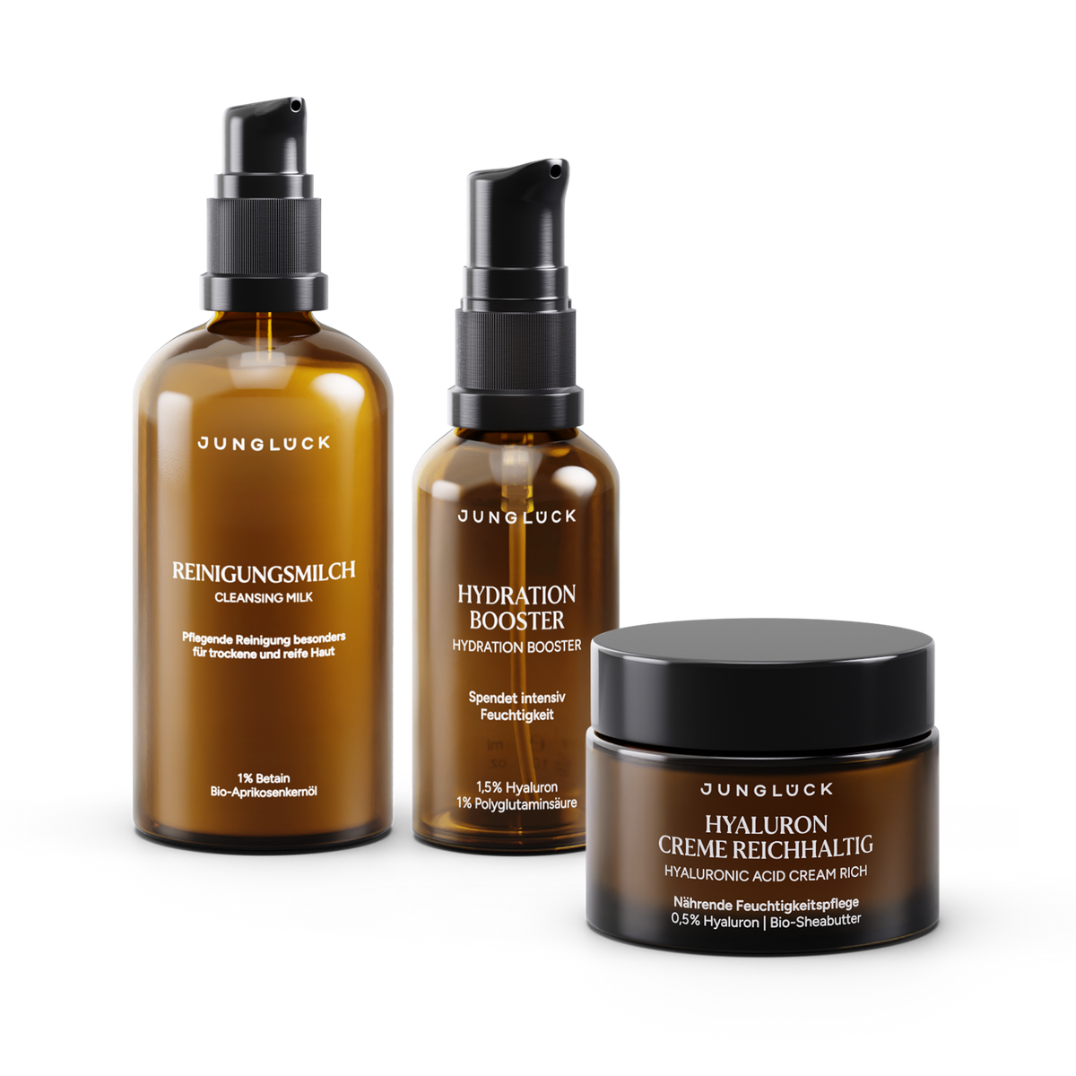 Set zur Reduzierung starker Trockenheit: Reinigungsmilch, Hydration Booster und cremereiche Hyaluronpflege in Braunglas.